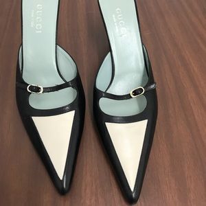 Pointed toe Gucci heels.